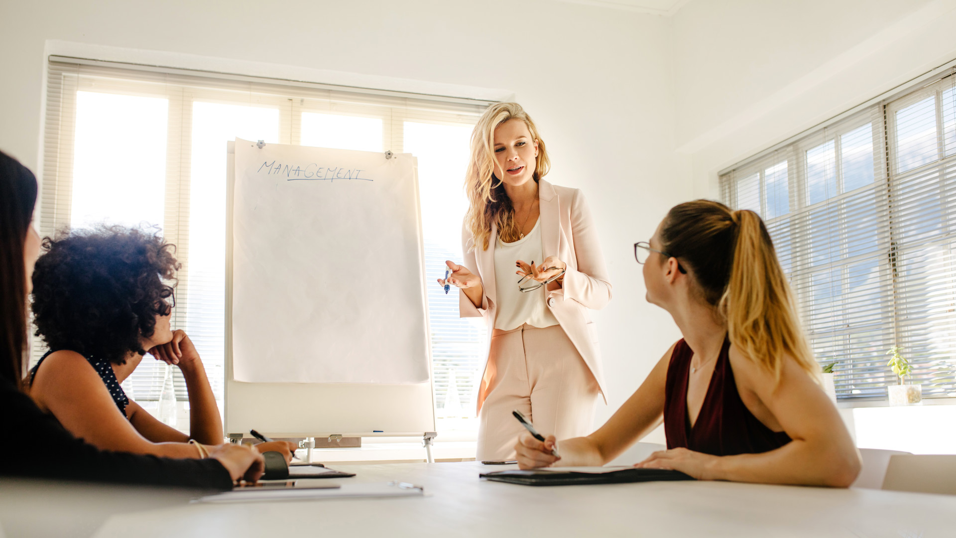 Female manager giving business presentation